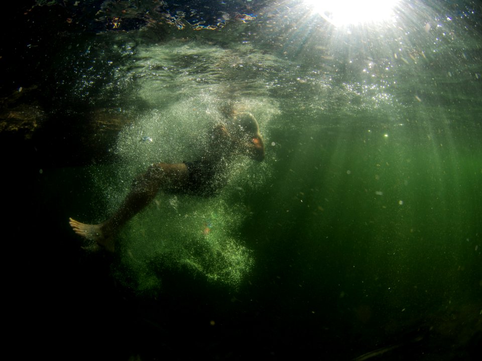 man in body of water