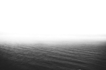 grayscale photography of body of water