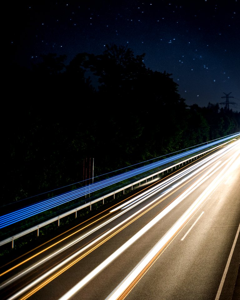 time lapse photo of road during night