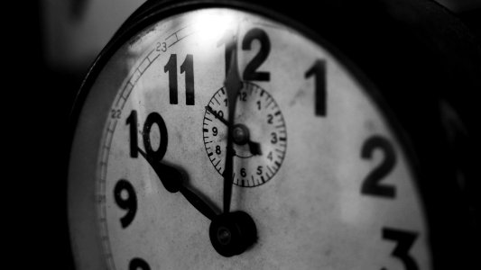 grayscale photography of pocket watch photo