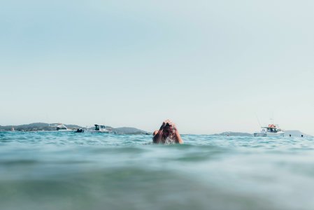 man on water during daytime photo