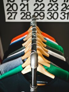 assorted-color hanged shirts with hangers photo