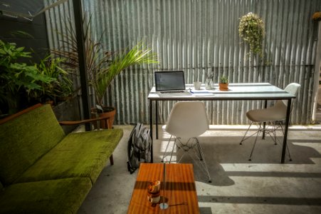 laptop computer on top of table photo