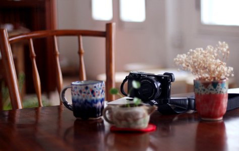 black camera on table photo