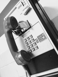 Telephone booth gray phone gray telephone photo