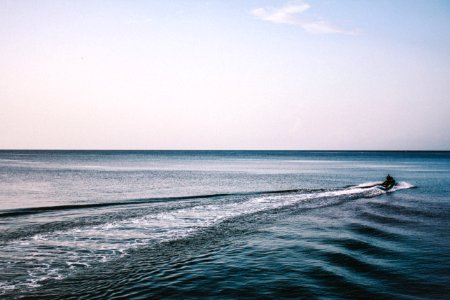 personal watercraft on body of water photo