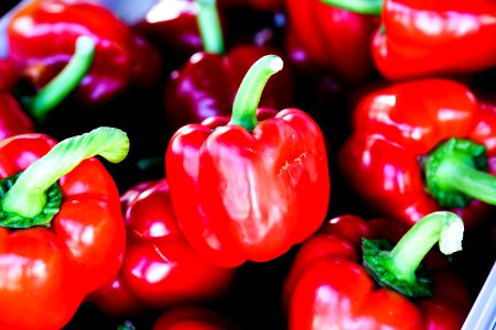bunch of red bell peppers photo