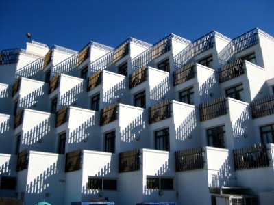 white concrete houses under blue sky photo