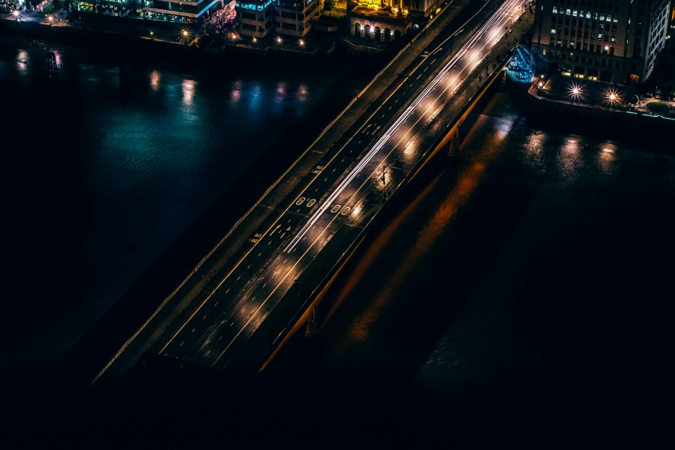 aerial view of building beside bridge photo