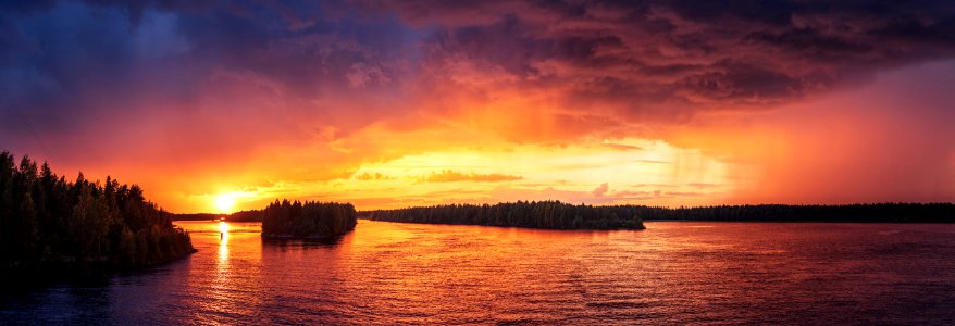 body of water during sunset