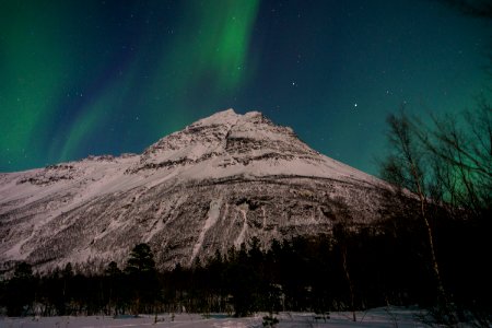 landscape photography of snow mountain under aurora borealis photo