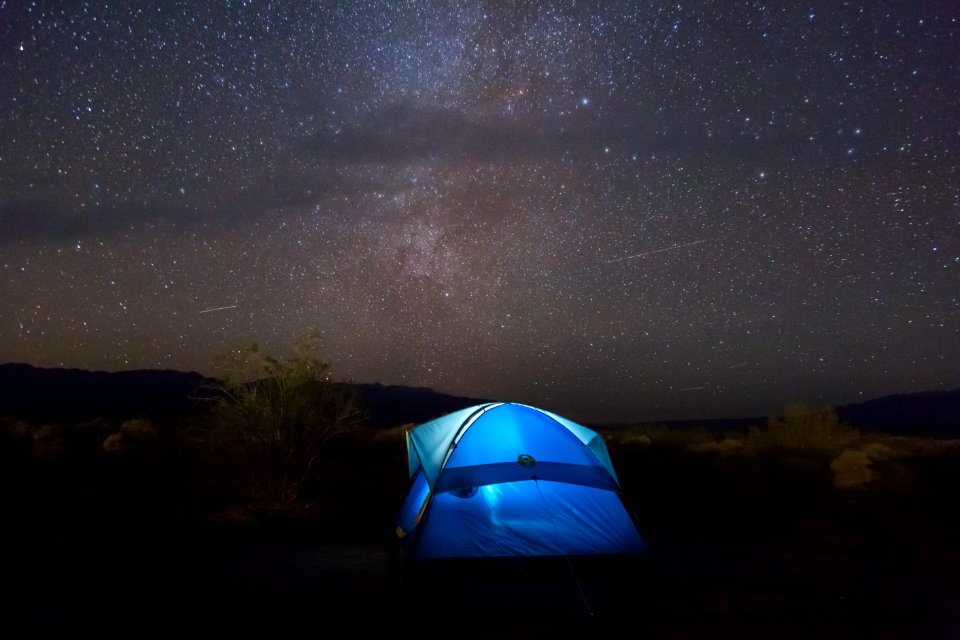 blue tent under starry sky