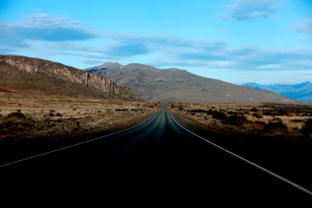 road in the desert during daytime photo