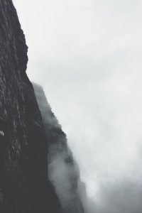 mountain ranges covered in white fog photo