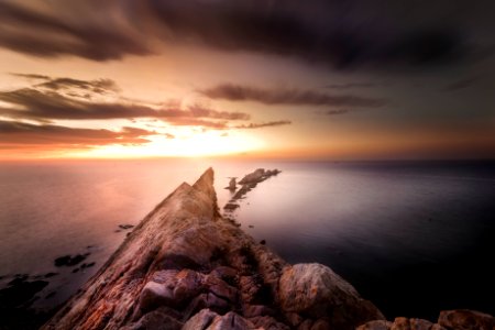 brown rock formation during sunset photo