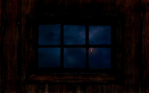 rectangular 6-pane window on brown wooden wall at nighttime photo
