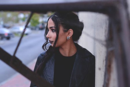 woman wearing black notched lapel top photo