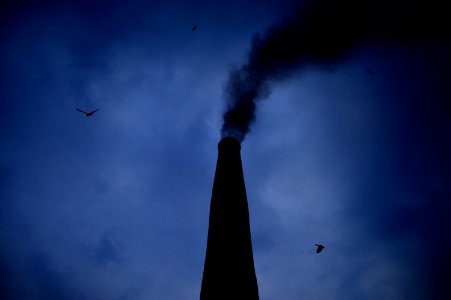 smoking chimney during night photo