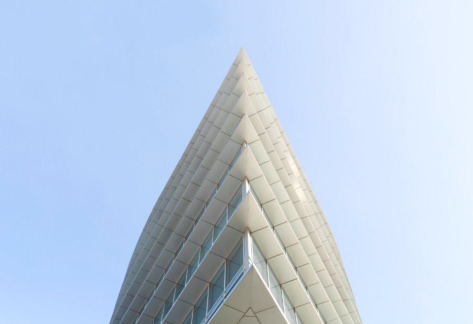 white building top under white skies