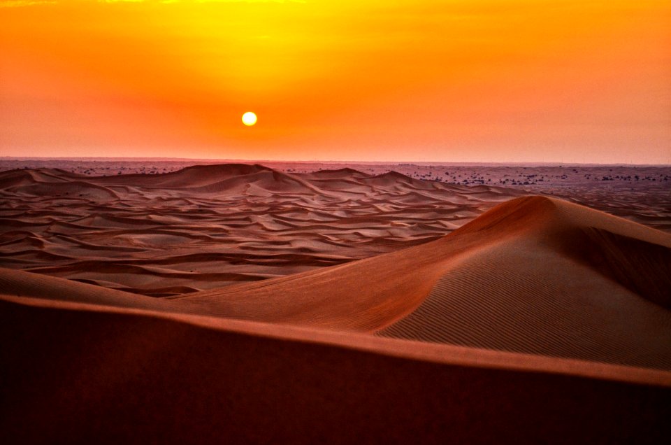 sand dunes during sunset