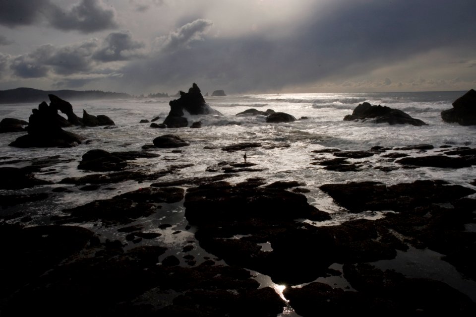 stack landform under cloudy sky nature photography