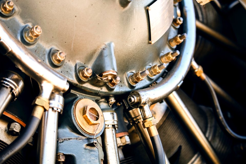 close up photography of gray engine part