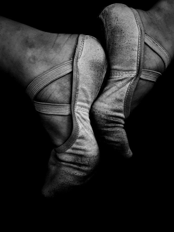 grayscale photography of woman ballet shoes