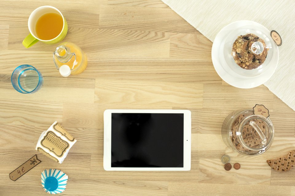white iPad on table