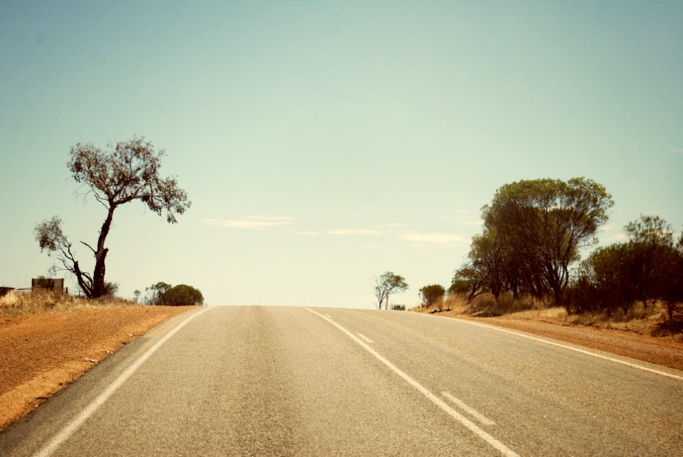 gray empty road under gray sky photo