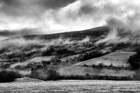 grayscale photo of mountains photo