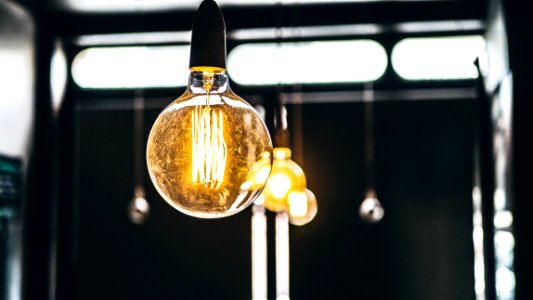 tilt shift lens photography of clear glass bulb