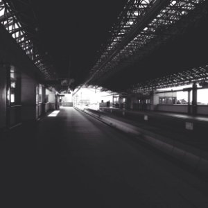 grayscale photography of train railway photo