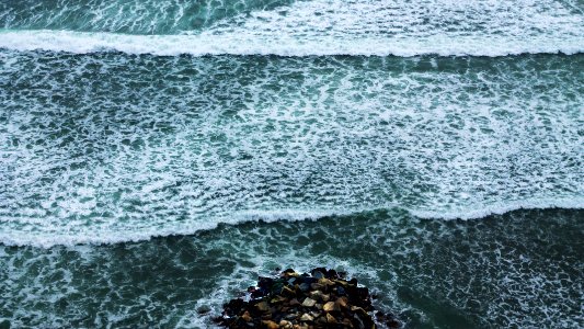 aerial view of ocean waves photo