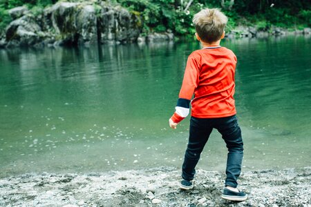 Child skip stone photo