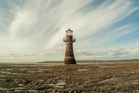 brown lighthouse during daytime photo