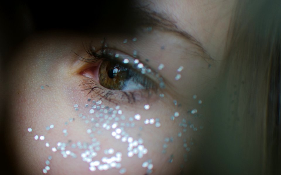 closeup photo of woman's left eye