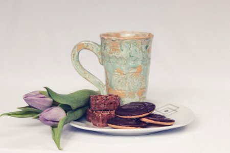 cookies beside ceramic mug photo