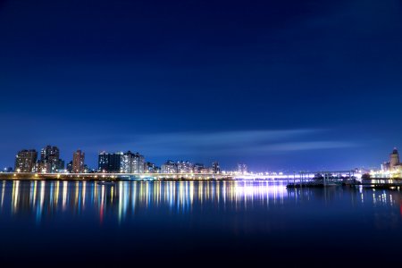 landscape photography of city town near body of water photo