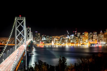 bridge beside city photo