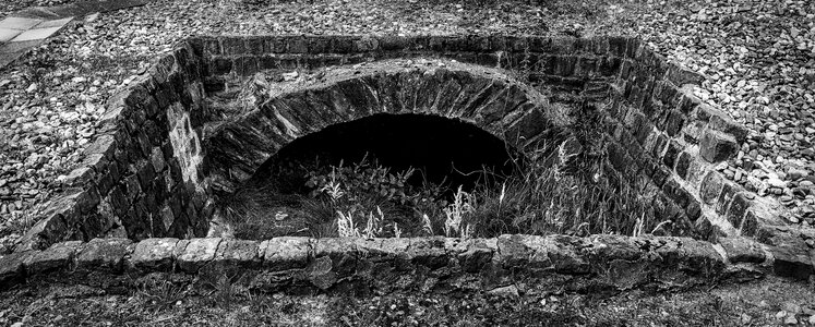 Catacombs underground hole photo