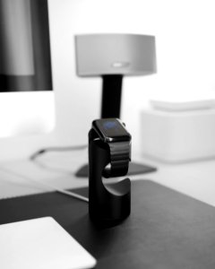 space black case Apple Watch on magnetic charger photo