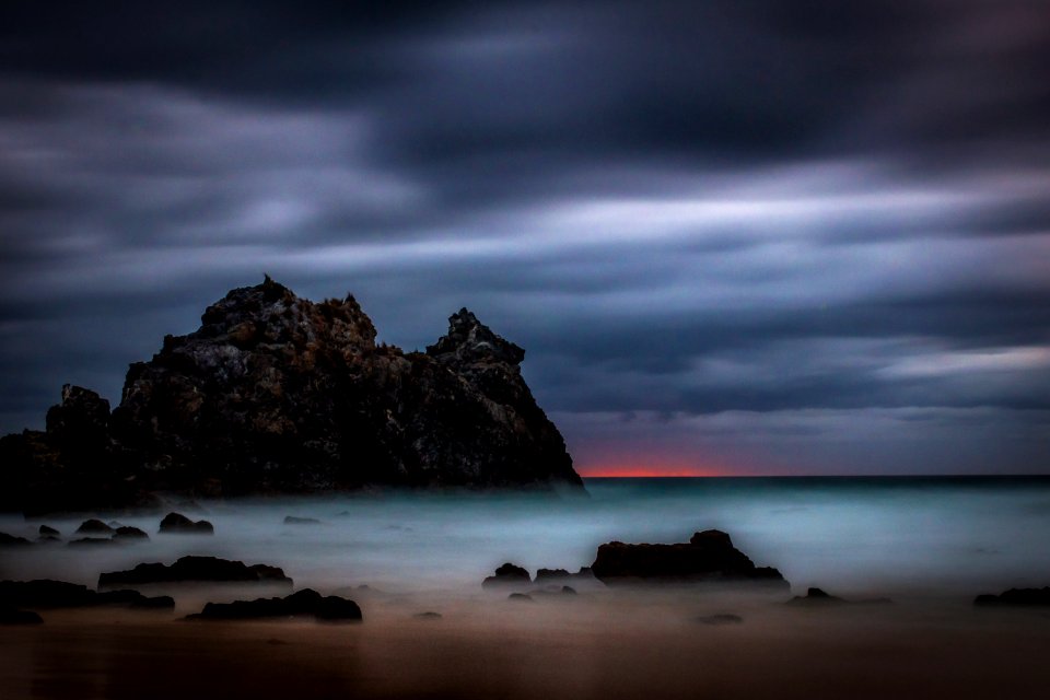 landscape photography of sea and rock formations
