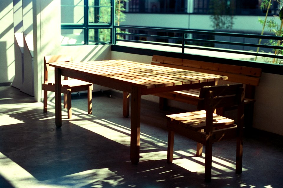 table and bench near window