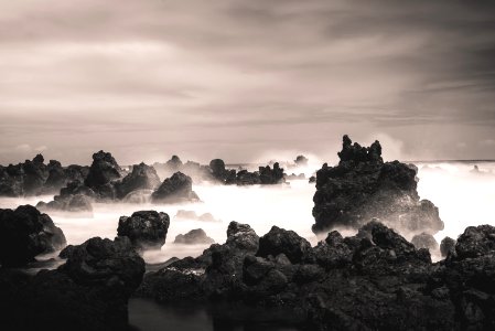 landscape photography of ocean waves crashing rocks photo