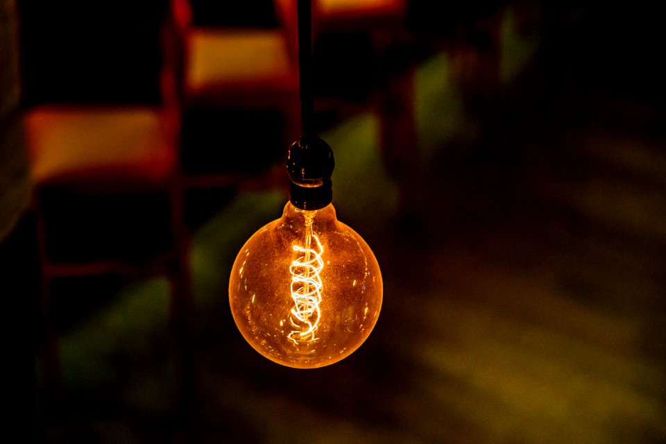 shallow focus photography of lighted bulb photo
