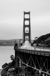 grascale photography of cable bridge photo