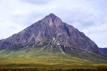 gray mountain under gray sky during daytime photo