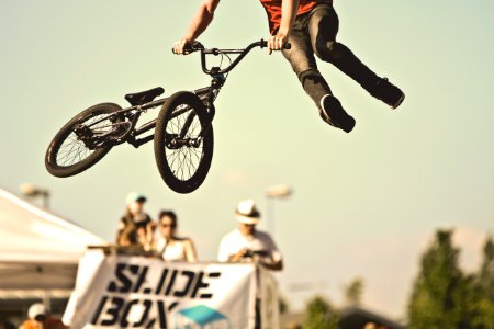 person doing BMX tricks photo