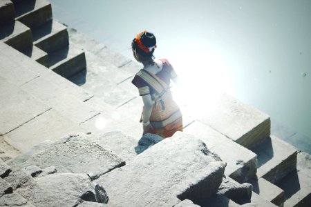 woman standing on concrete platform