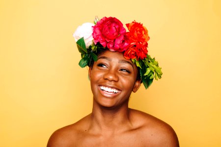 woman smiling wearing flower crown photo